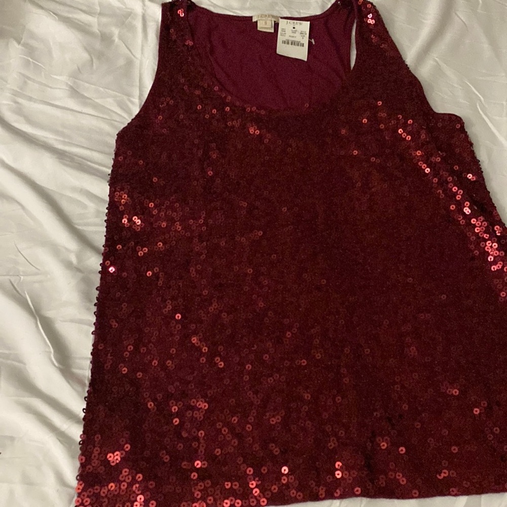 Brand new glittery top from J crew. Perfect for the party. 100% cotton.